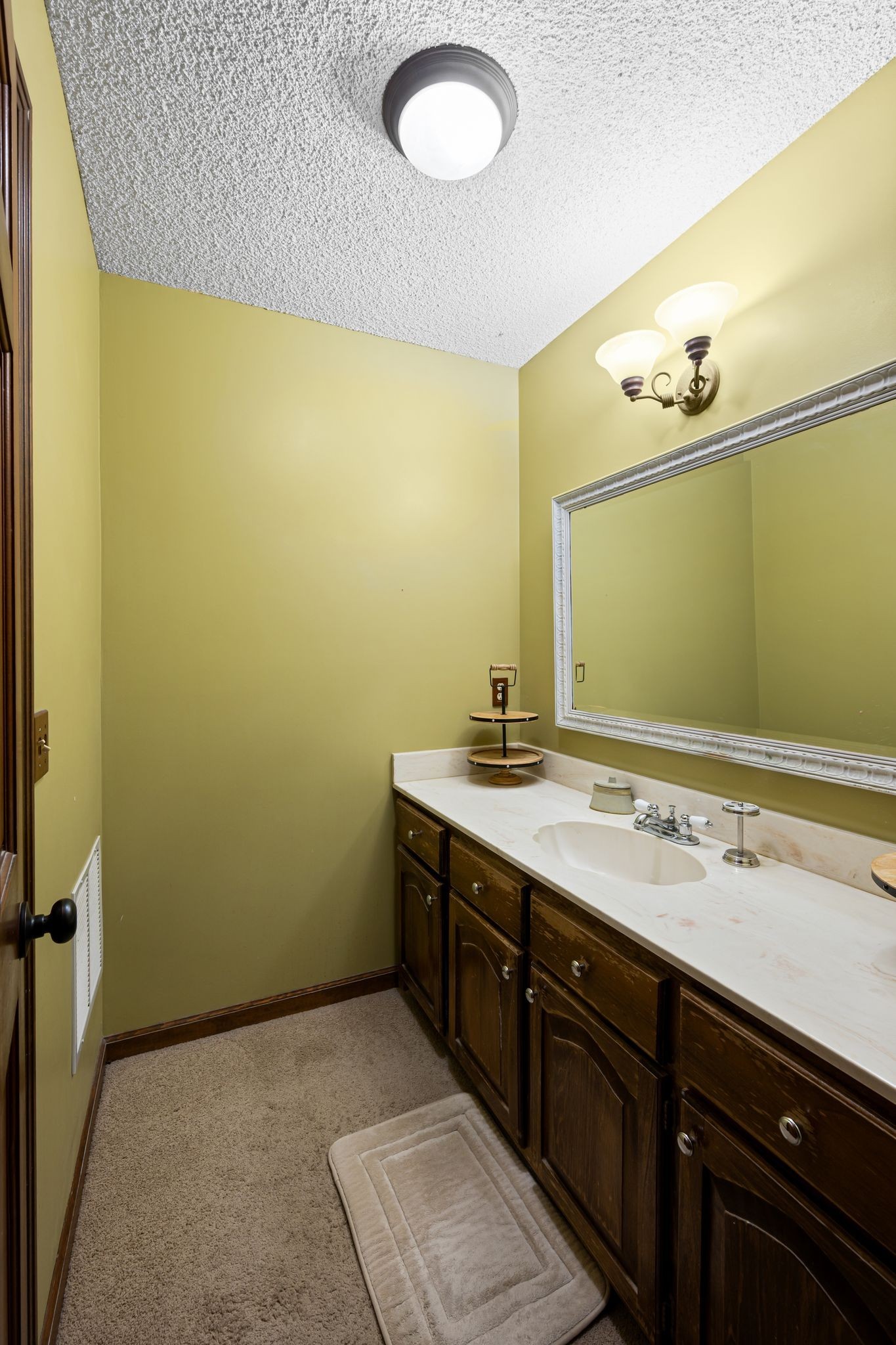 154 B Spring Valley Road Nashville, TN 37214 - Photo 19 of 29 a bathroom with a sink and a mirror
