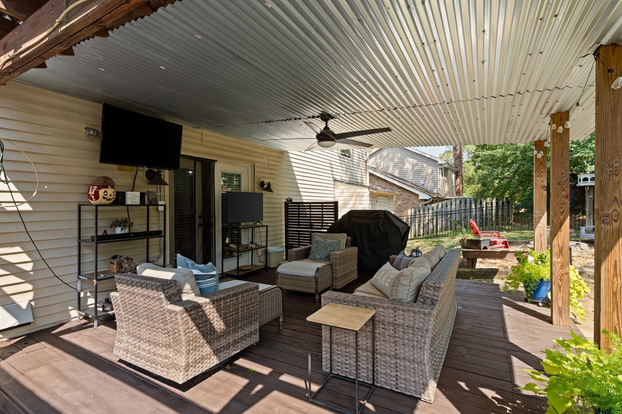 154 B Spring Valley Road Nashville, TN 37214 - Photo 28 of 29 a outdoor space with patio the couches and a fireplace