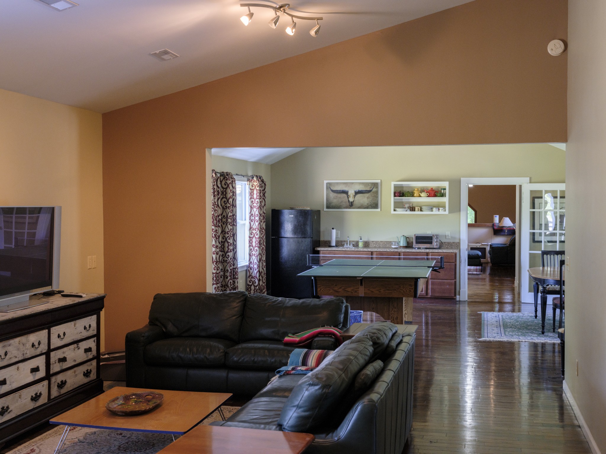 1098 Fred Gibbs Road White Bluff, TN 37187 - Photo 34 of 72 a living room with furniture and a flat screen tv with wooden floor
