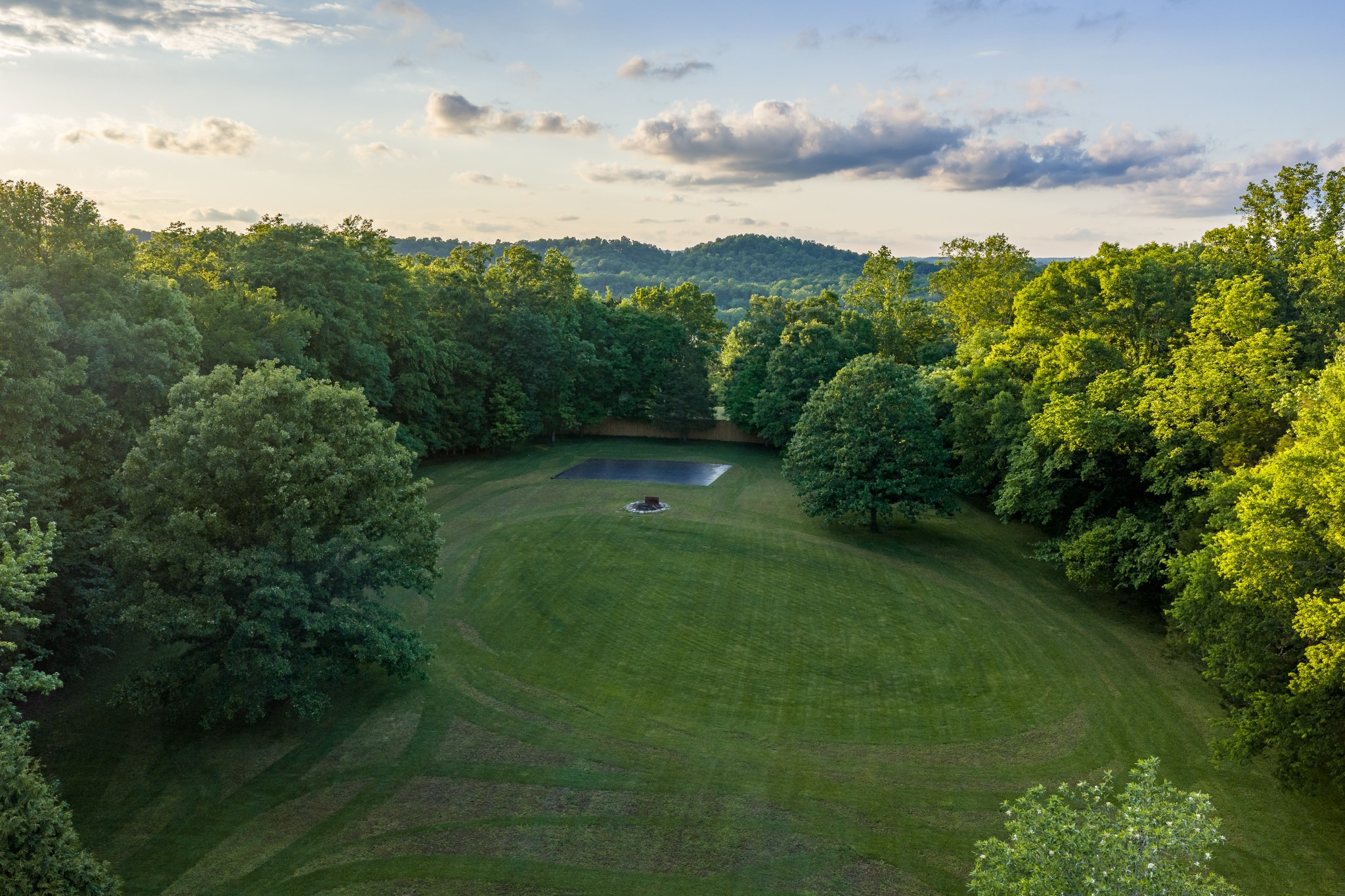 1098 Fred Gibbs Road White Bluff, TN 37187 - Photo 46 of 72 a view of a big yard with potted plants and mountain view