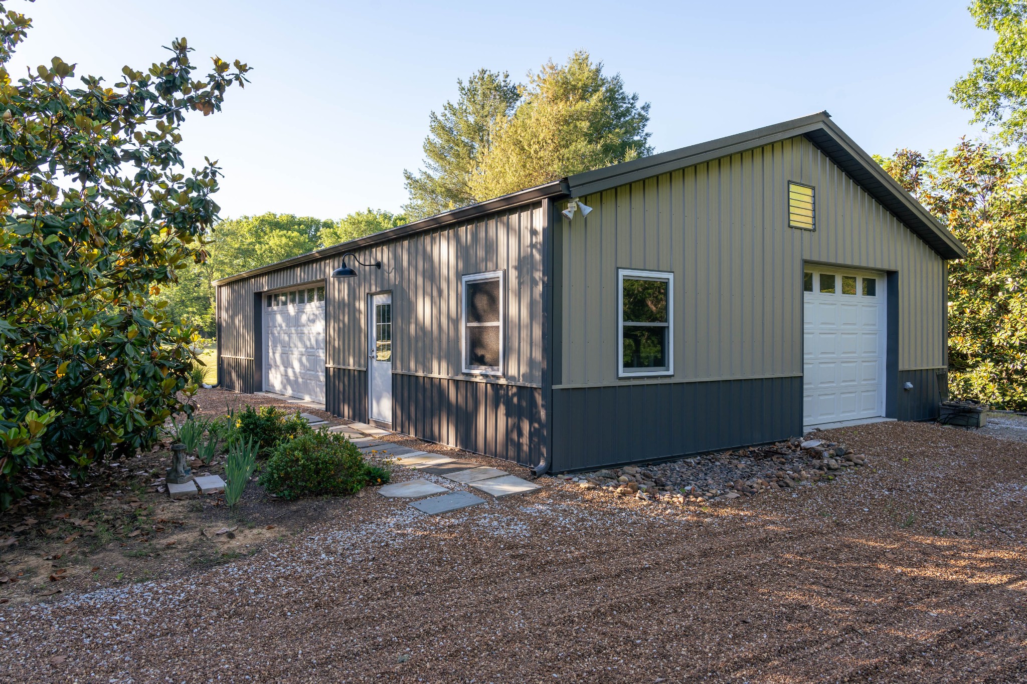 1098 Fred Gibbs Road White Bluff, TN 37187 - Photo 56 of 72 a front view of house with yard and trees around