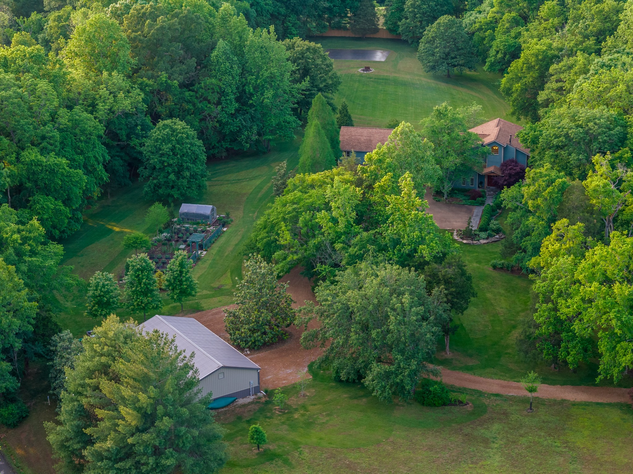 1098 Fred Gibbs Road White Bluff, TN 37187 - Photo 62 of 72 an aerial view of a house with pool outdoor seating and yard