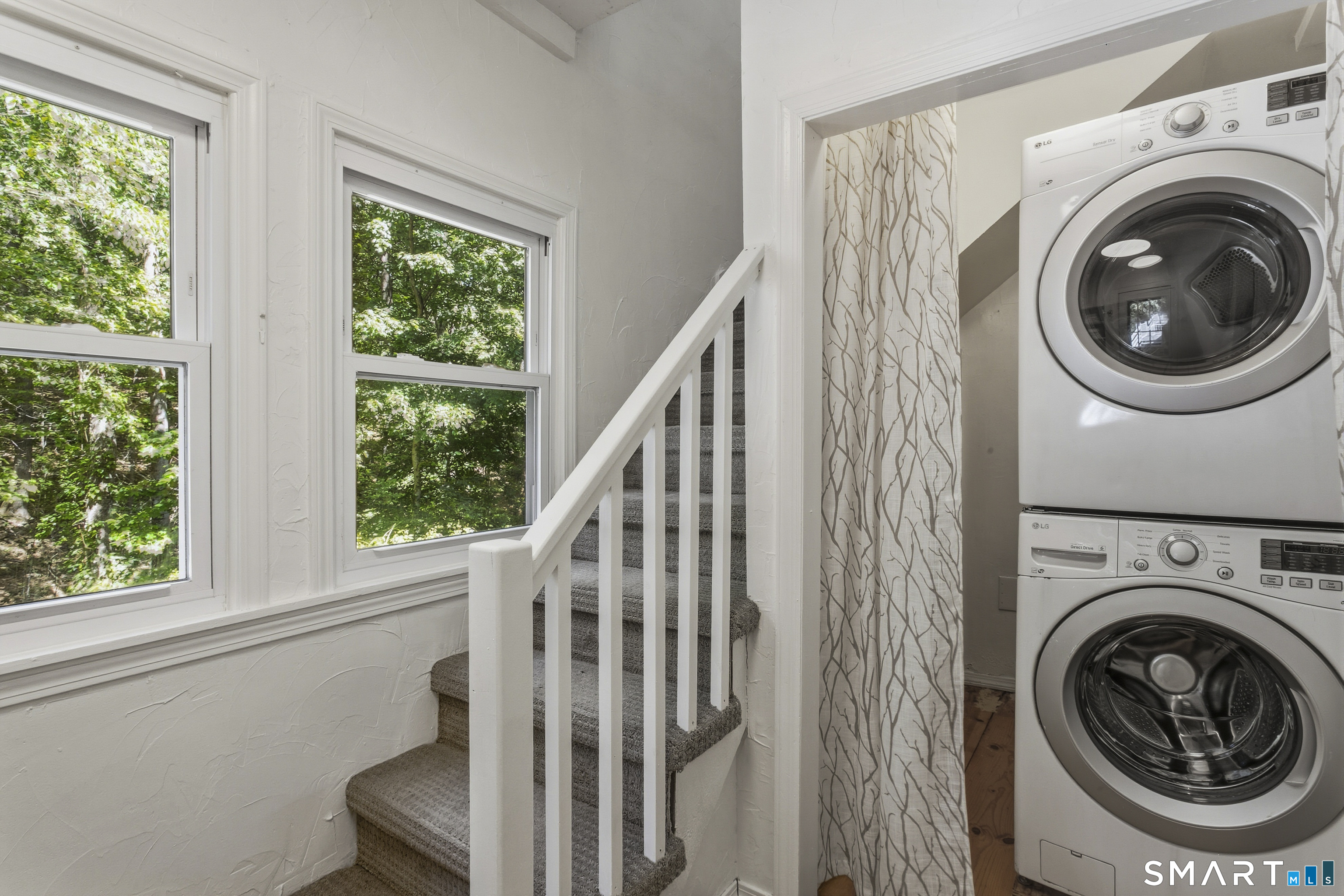 188 Bacon Road Roxbury, CT 06783 - Photo 17 of 33 a view of a hallway with washer and dryer