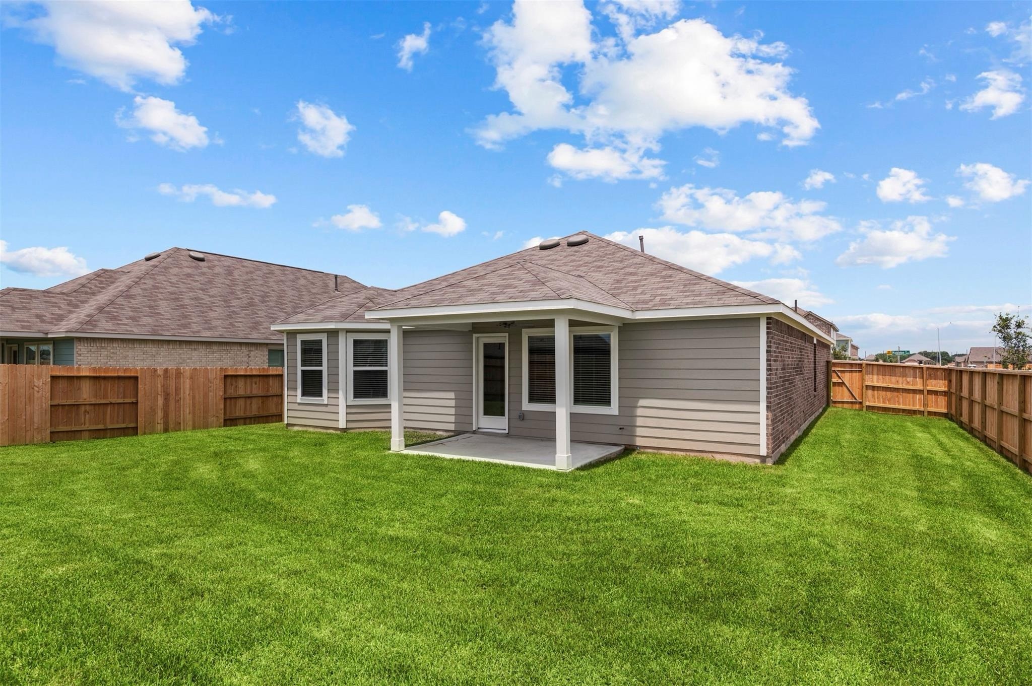 3003 Middleton Drive Rosenberg, TX 77471 - Photo 14 of 18 a front view of a house with garden
