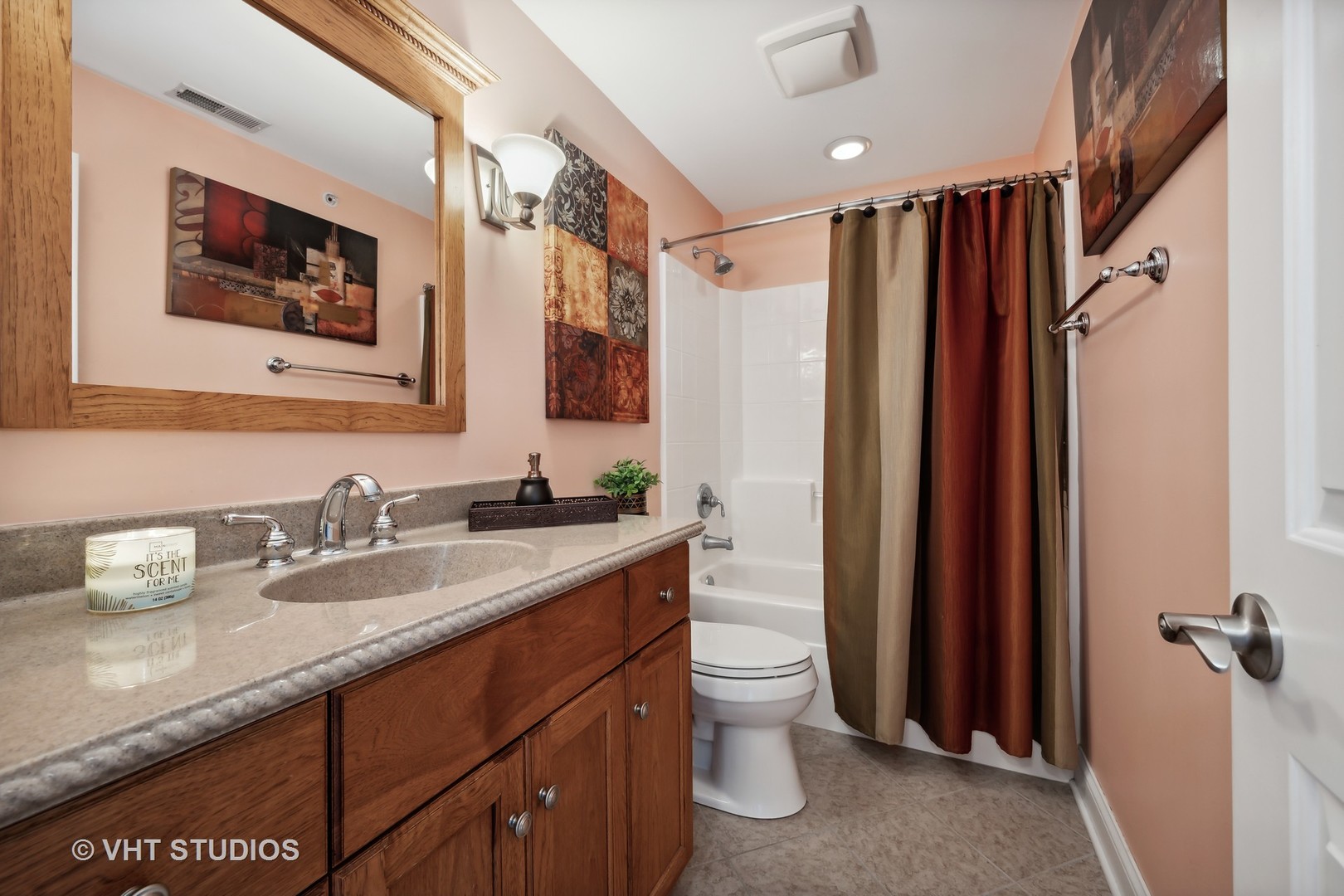 318 Ridge Road, Unit 318 North Aurora, IL 60542 - Photo 11 of 13 a bathroom with a granite countertop sink toilet and shower