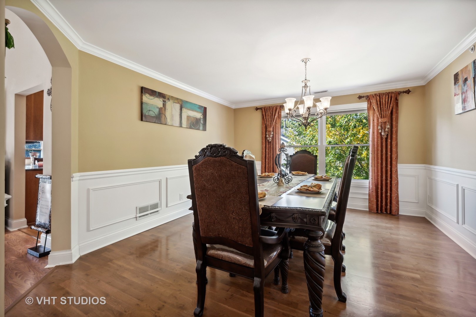 318 Ridge Road, Unit 318 North Aurora, IL 60542 - Photo 3 of 13 a view of a dining room with furniture window and wooden floor