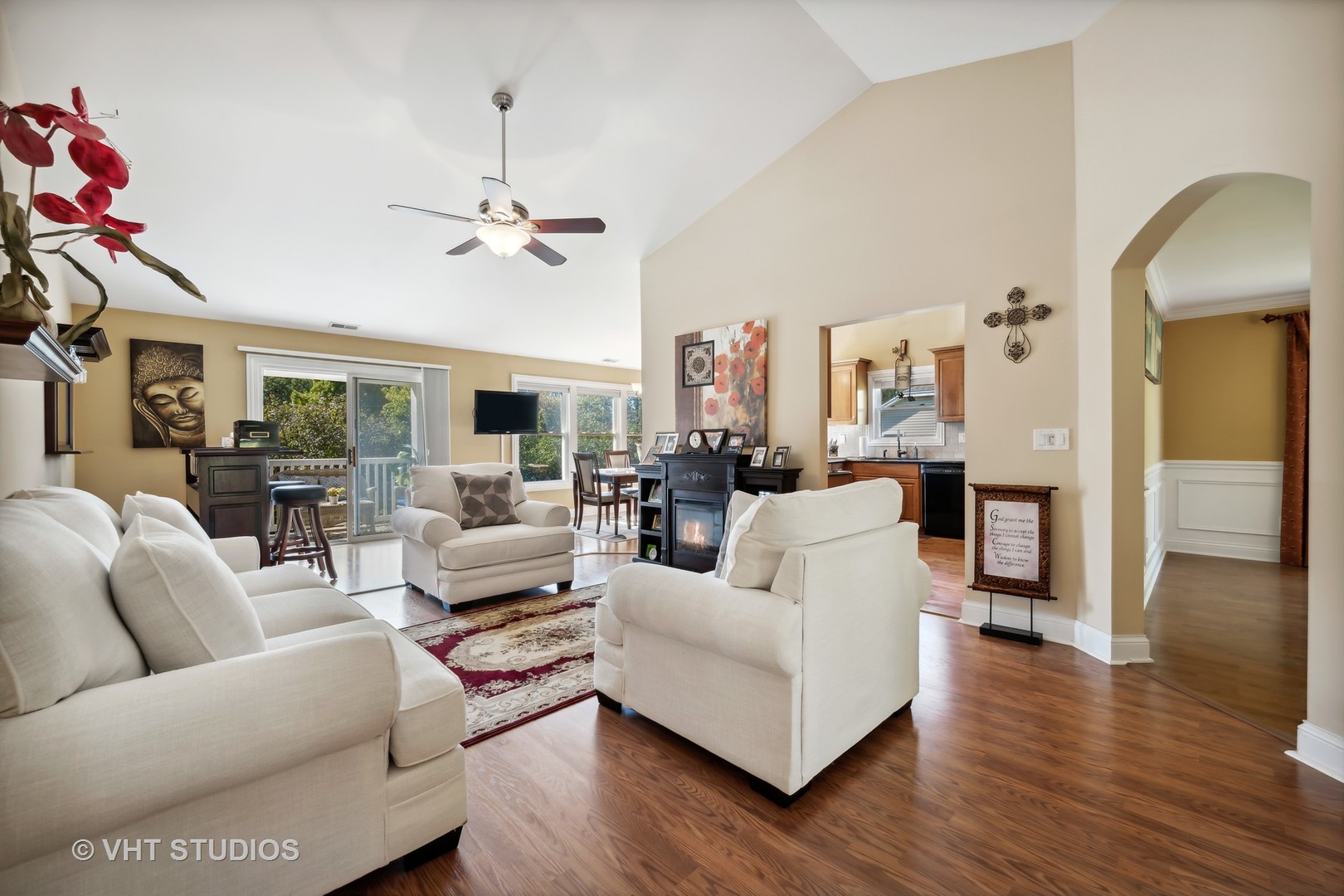 318 Ridge Road, Unit 318 North Aurora, IL 60542 - Photo 7 of 13 a living room with furniture white walls and wooden floor