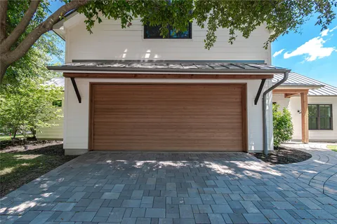a view of a backyard of the house