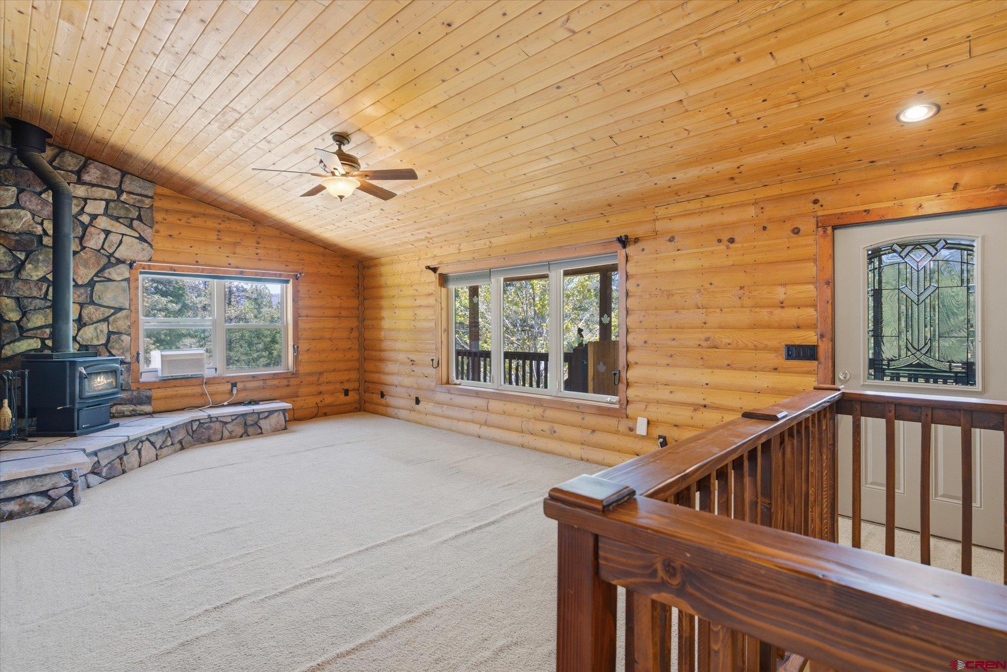 30 Stage Coach Road Bayfield, CO 81122 - Photo 9 of 43 a view of house with large windows