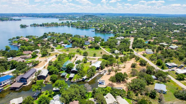 a view of a lake with a city