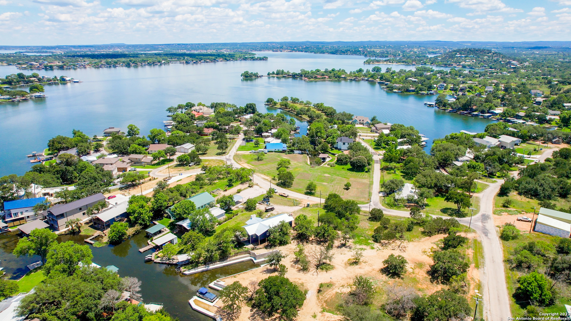 101 Princess Terrace Sunrise Beach, TX 78643 - Photo 3 of 17 a view of a lake with a city