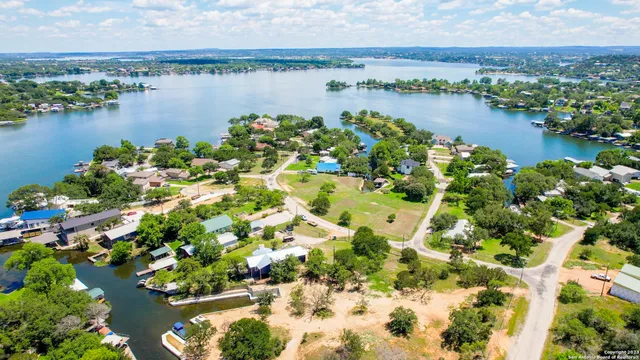 a view of a lake with a city