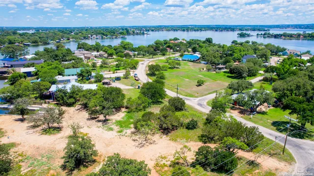 a view of a lake with a building in the background