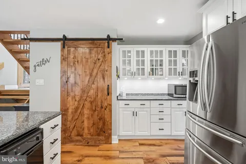 a bed room with a bed and a window