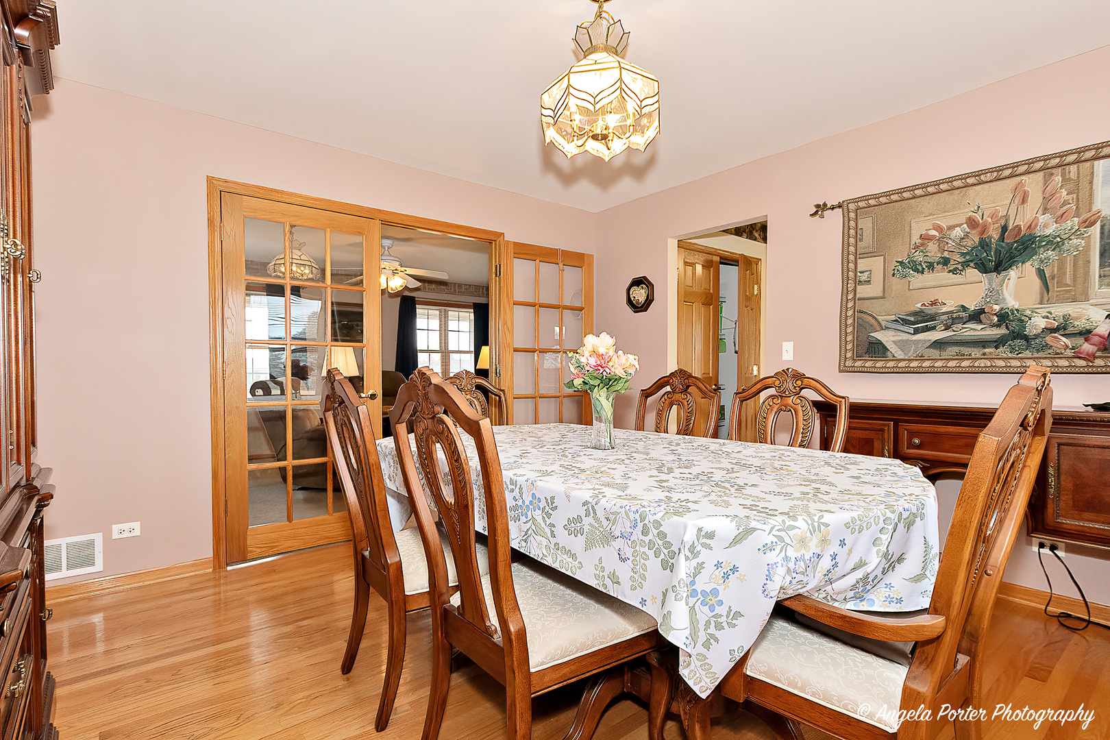 814 Suzanne Lane Spring Grove, IL 60081 - Photo 16 of 45 a view of a dining room with furniture and wooden floor