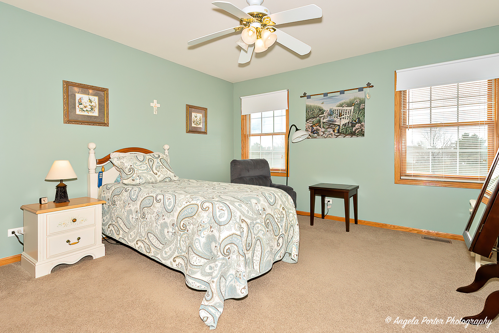 814 Suzanne Lane Spring Grove, IL 60081 - Photo 24 of 45 a bedroom with a bed and a chandelier
