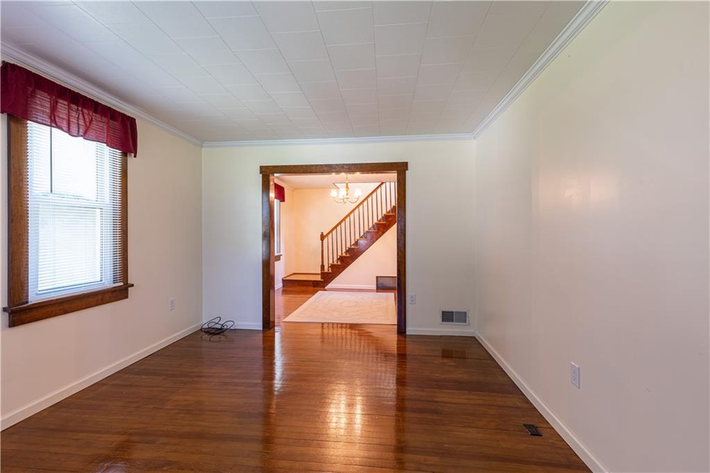 216 Carson Road Dawson, PA 15428 - Photo 5 of 25 a view of an entryway with wooden floor