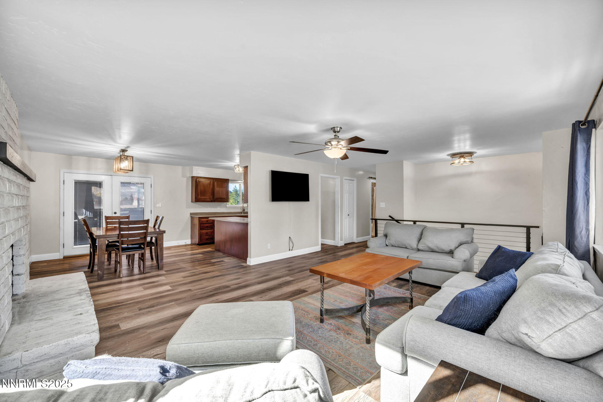14595 Chamy Drive Reno, NV 89521 - Photo 14 of 66 a living room with furniture and wooden floor