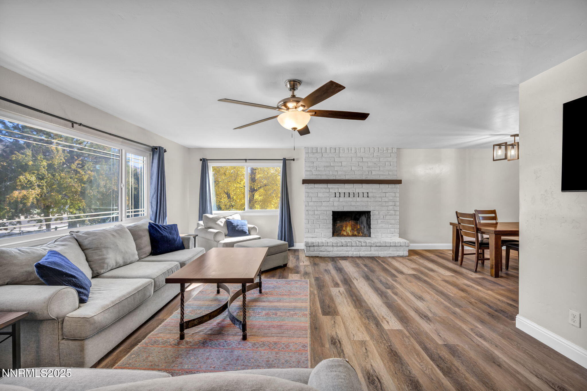 14595 Chamy Drive Reno, NV 89521 - Photo 16 of 66 a living room with furniture fireplace and window