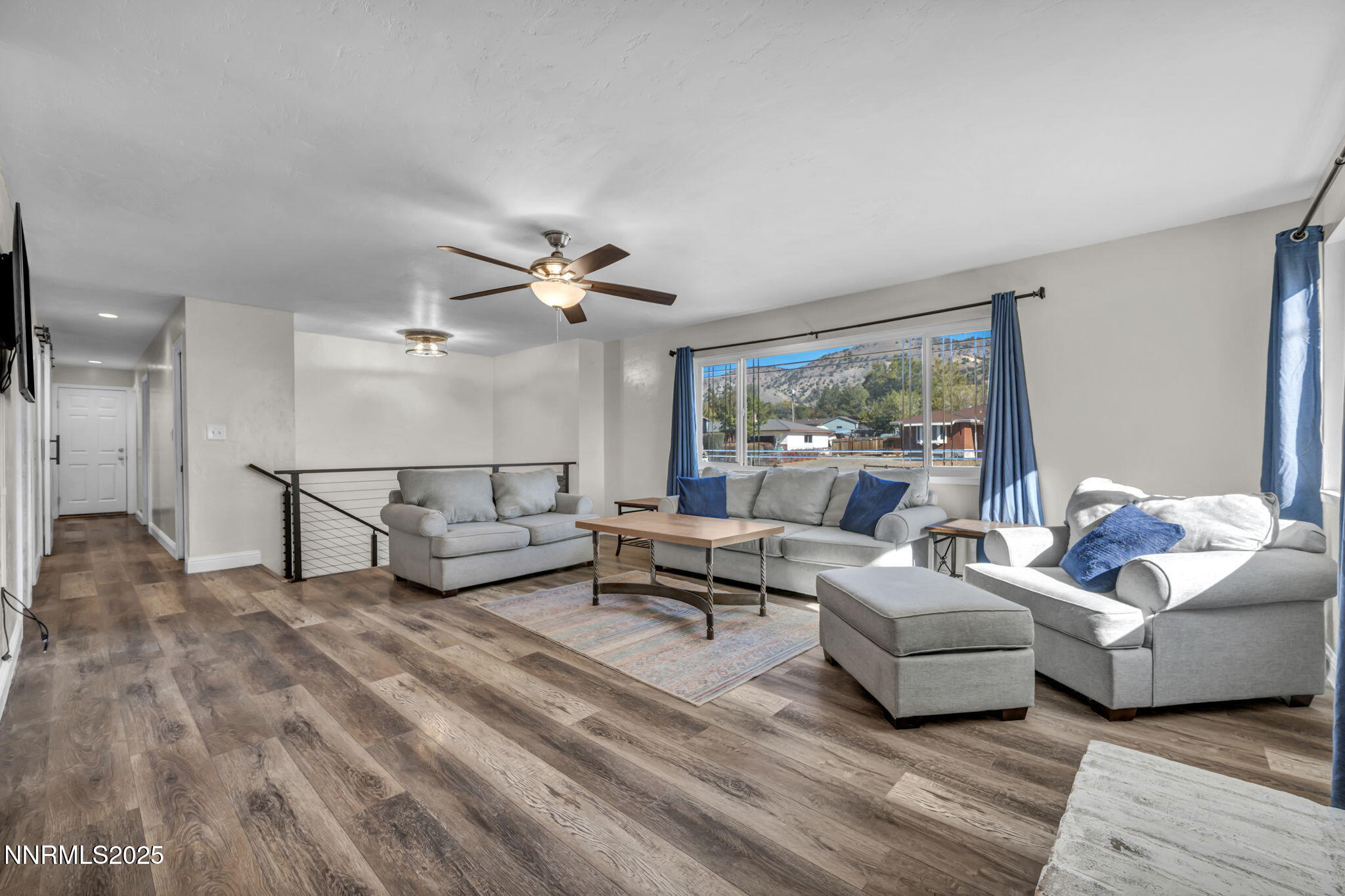 14595 Chamy Drive Reno, NV 89521 - Photo 3 of 66 a living room with furniture and a large window