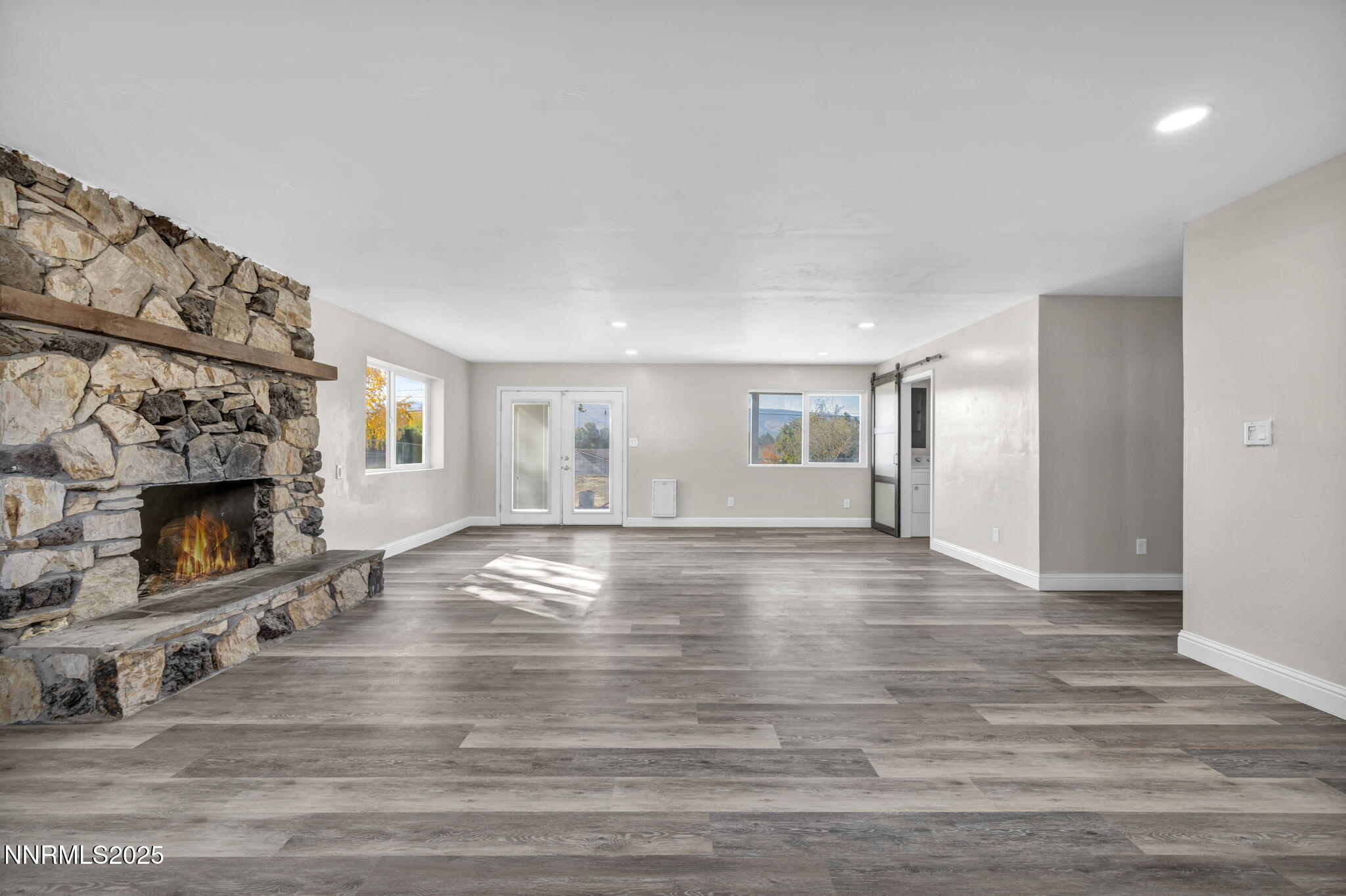 14595 Chamy Drive Reno, NV 89521 - Photo 46 of 66 a view of livingroom with hardwood floor and fireplace