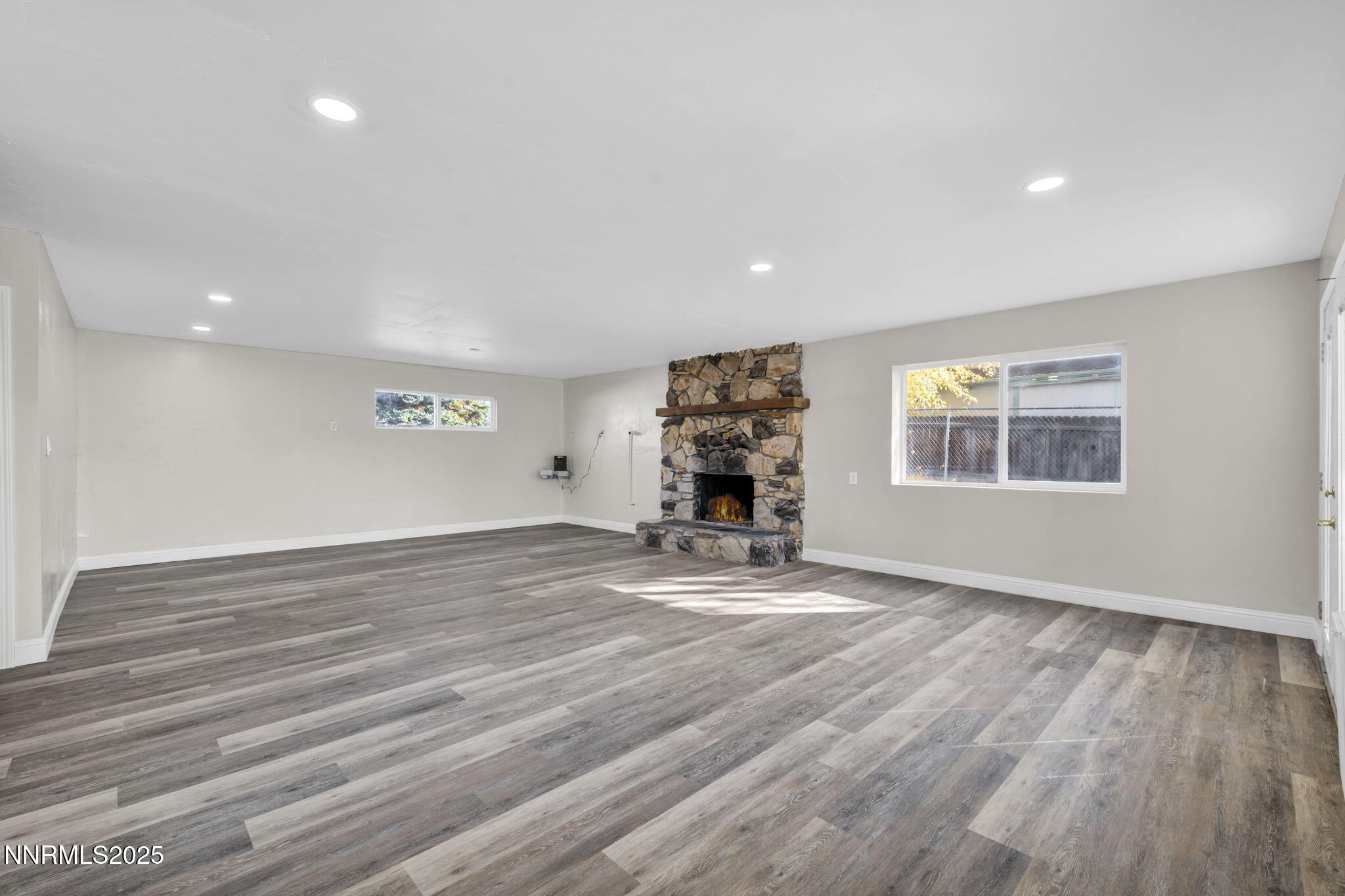14595 Chamy Drive Reno, NV 89521 - Photo 50 of 66 wooden floor in an empty room with a window