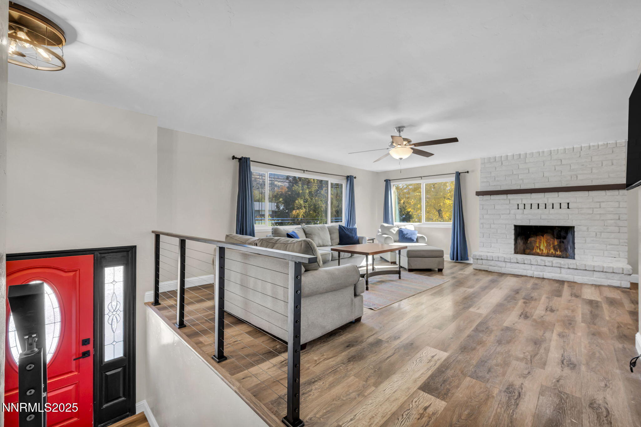 14595 Chamy Drive Reno, NV 89521 - Photo 5 of 66 a living room with furniture and a fireplace