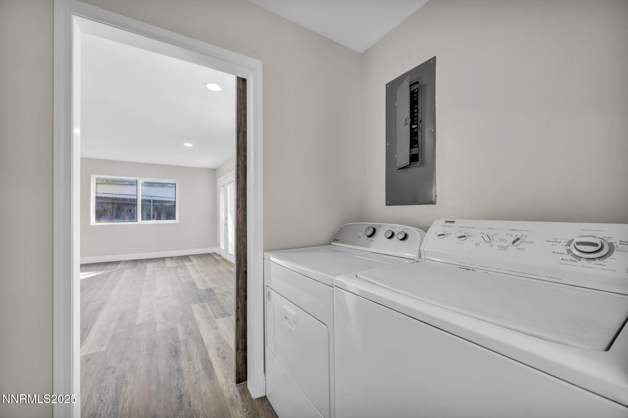 14595 Chamy Drive Reno, NV 89521 - Photo 52 of 66 a view of washer and dryer with wooden floor