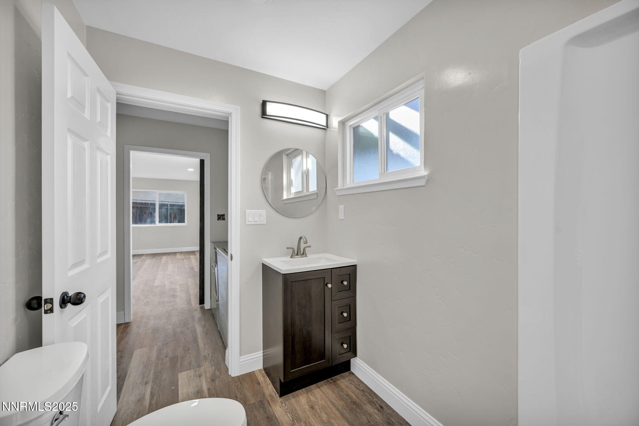 14595 Chamy Drive Reno, NV 89521 - Photo 58 of 66 a bathroom with a sink and a mirror