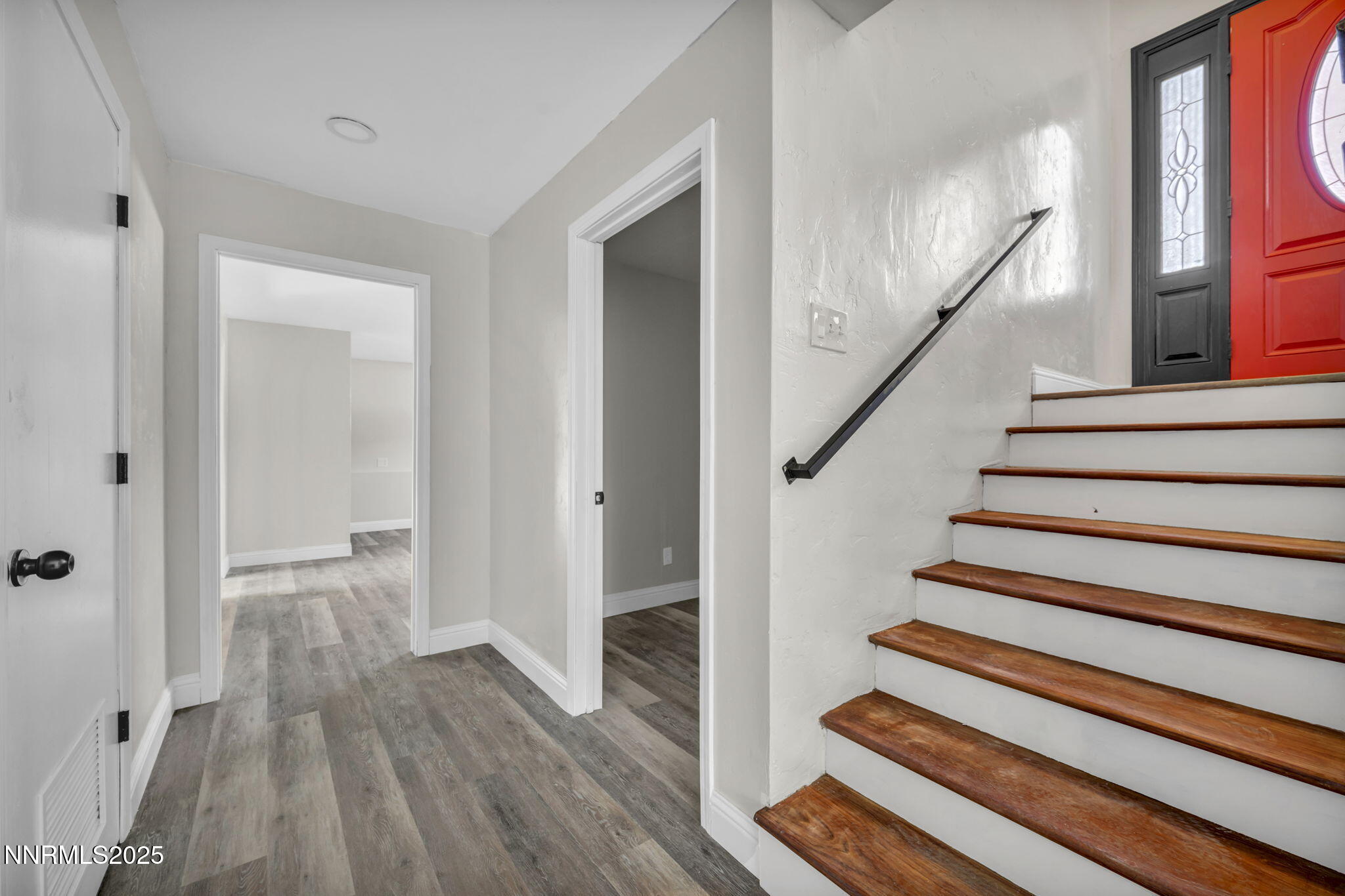 14595 Chamy Drive Reno, NV 89521 - Photo 59 of 66 a view of an entryway with wooden floor and staircase