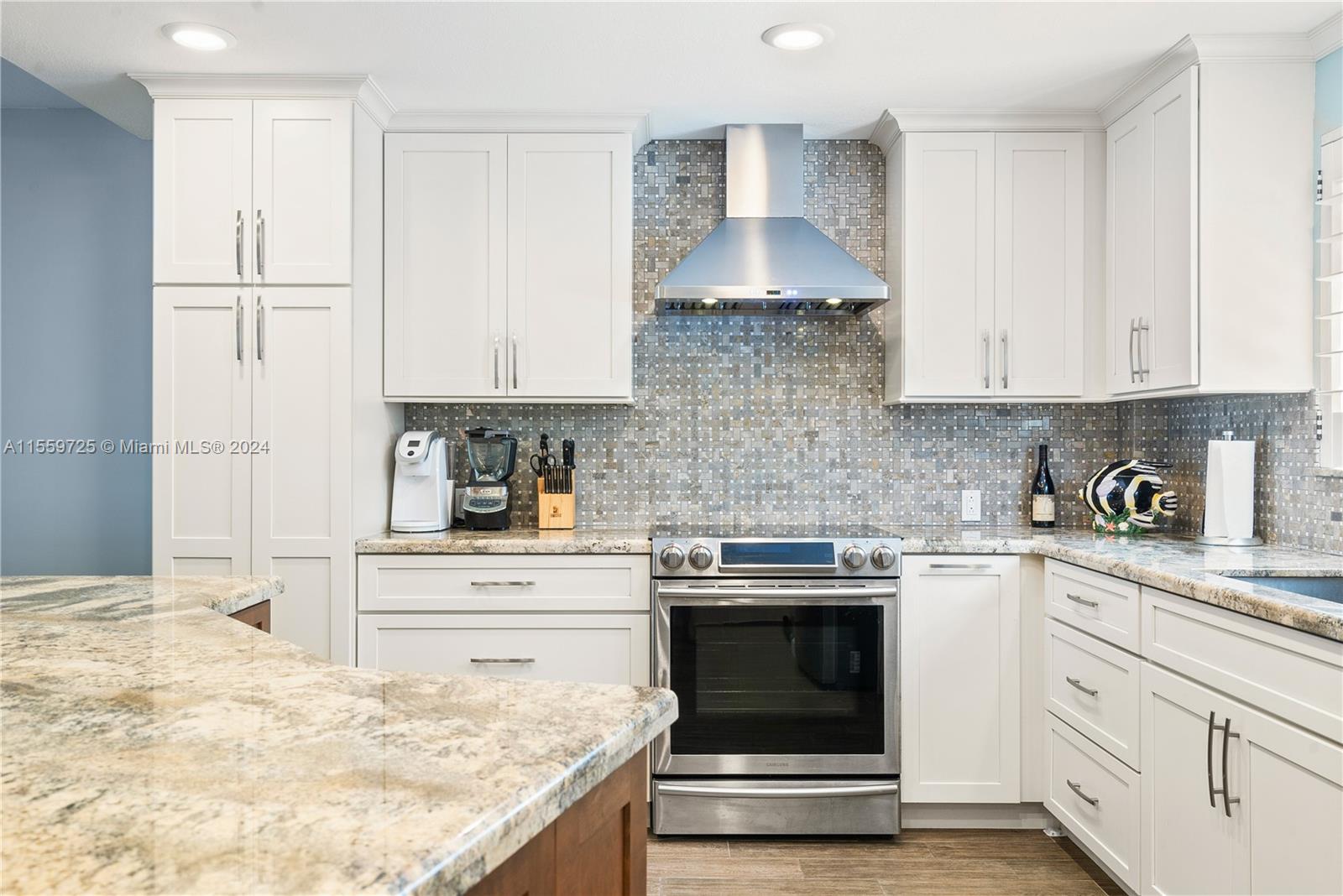 209 Sanctuary Dr., Unit 209 Key Largo, FL 33037 - Photo 11 of 43 a kitchen with stainless steel appliances granite countertop a sink stove and refrigerator
