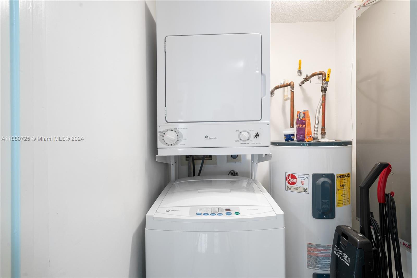 209 Sanctuary Dr., Unit 209 Key Largo, FL 33037 - Photo 15 of 43 a utility room with dryer and washer