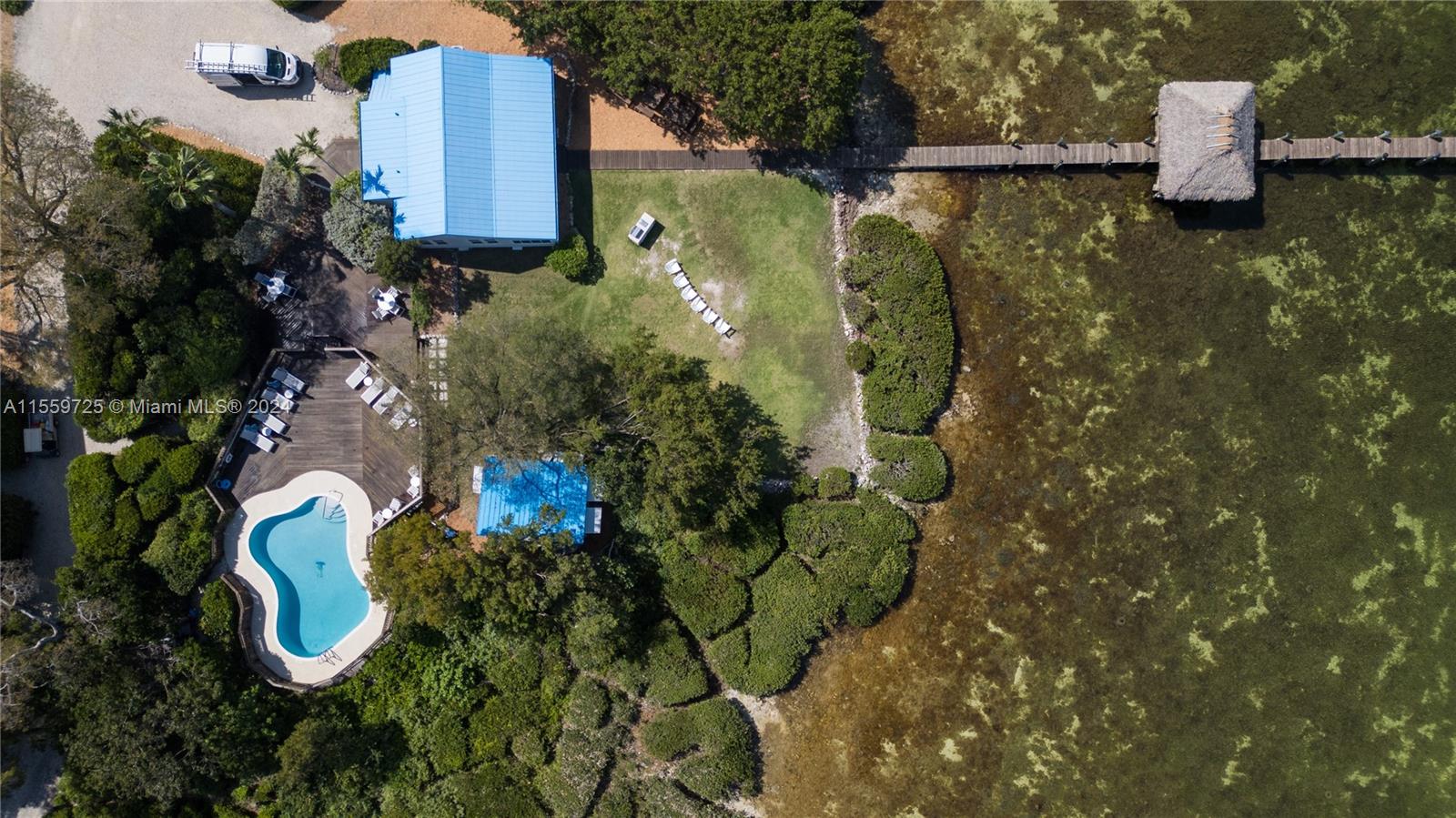 209 Sanctuary Dr., Unit 209 Key Largo, FL 33037 - Photo 39 of 43 a bird view of a house with a yard