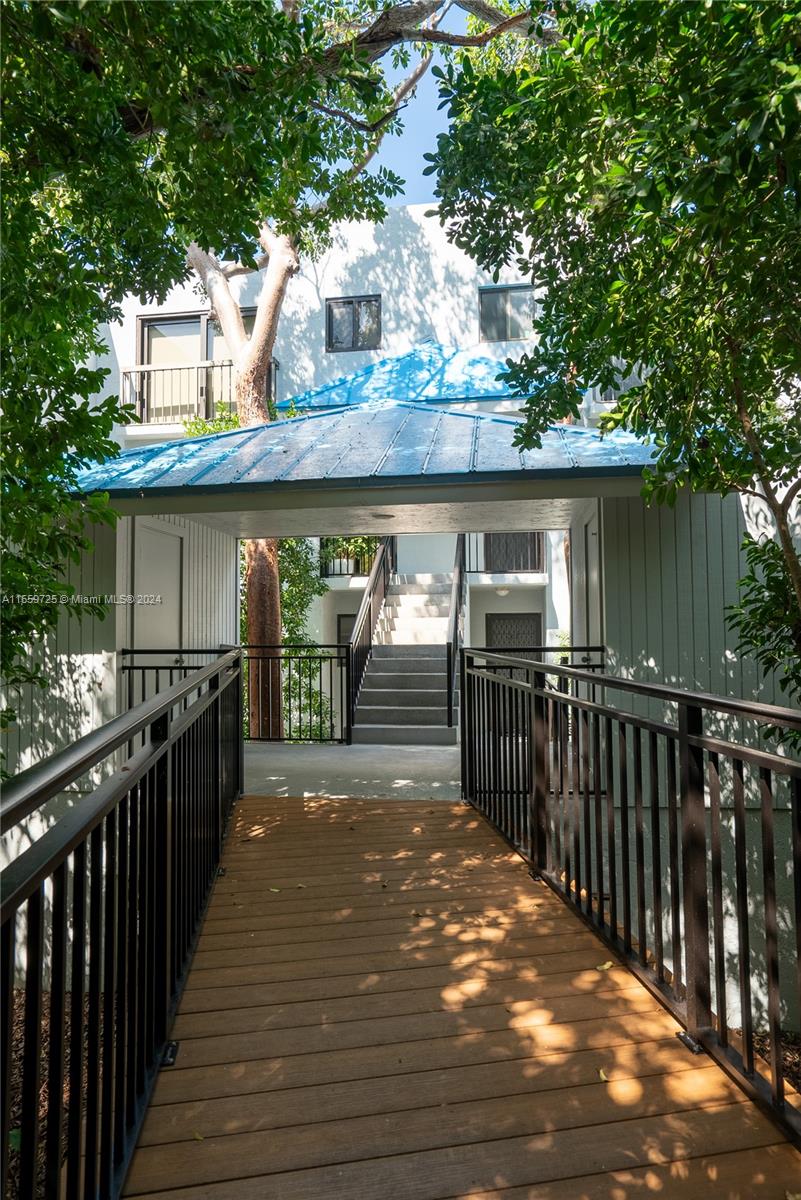 209 Sanctuary Dr., Unit 209 Key Largo, FL 33037 - Photo 43 of 43 a view of a hardwood deck