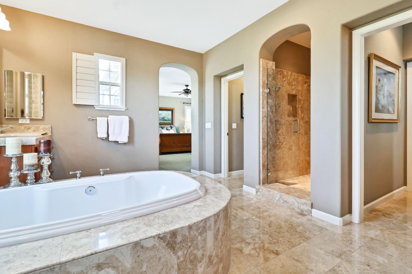 7120 Eagle Ridge Drive Gilroy, CA 95020 - Photo 11 of 21 a spacious bedroom with a bed and a mirror