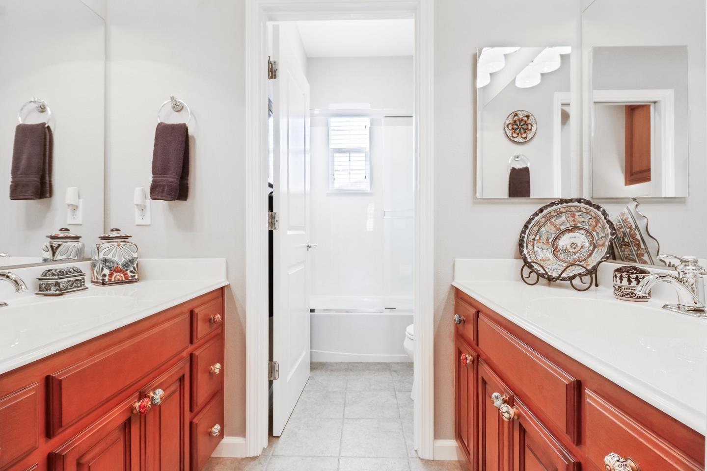 7120 Eagle Ridge Drive Gilroy, CA 95020 - Photo 14 of 21 a bathroom with a sink a toilet and mirror