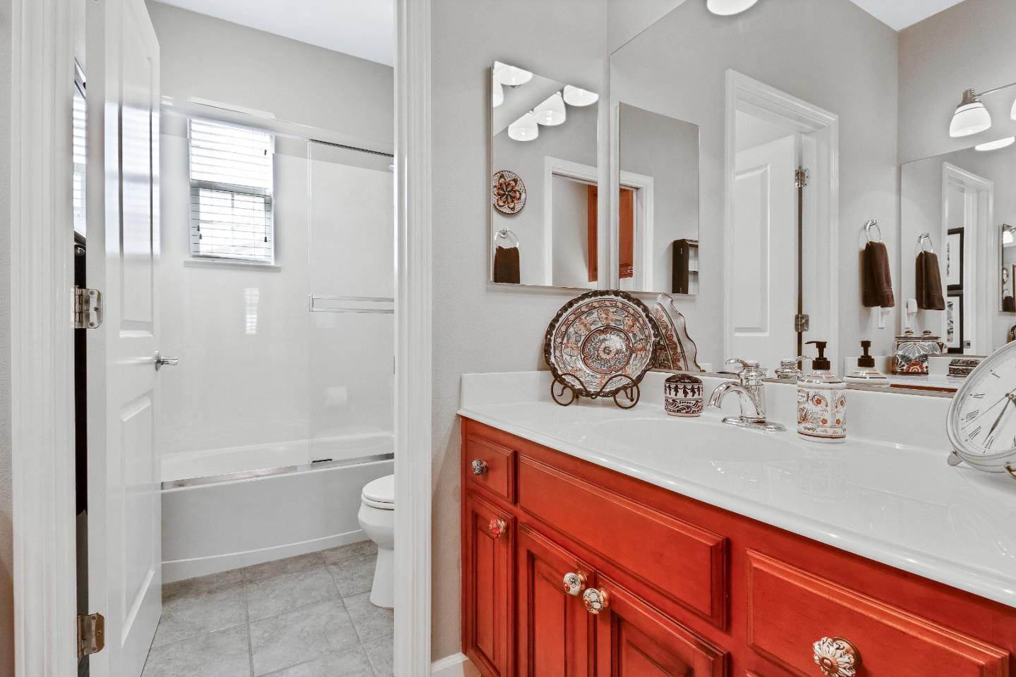 7120 Eagle Ridge Drive Gilroy, CA 95020 - Photo 15 of 21 a bathroom with a sink a toilet and a bathtub