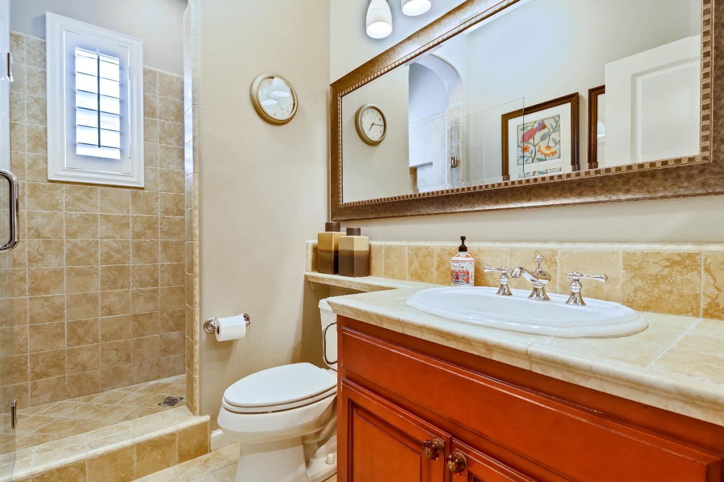 7120 Eagle Ridge Drive Gilroy, CA 95020 - Photo 17 of 21 a bathroom with a sink a toilet and a mirror