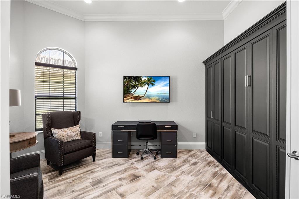 6502 Roma Way Naples, FL 34113 - Photo 29 of 43 a workspace with furniture and a window