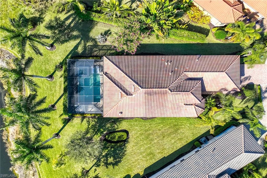 6502 Roma Way Naples, FL 34113 - Photo 5 of 43 a view of a backyard with plants