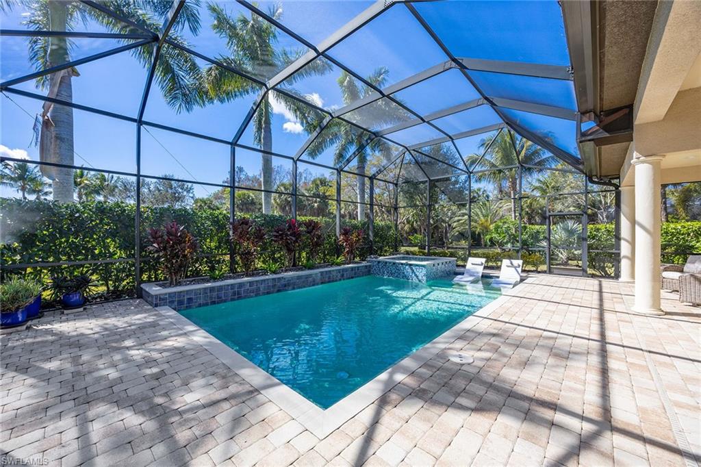 6502 Roma Way Naples, FL 34113 - Photo 9 of 43 a view of a backyard
