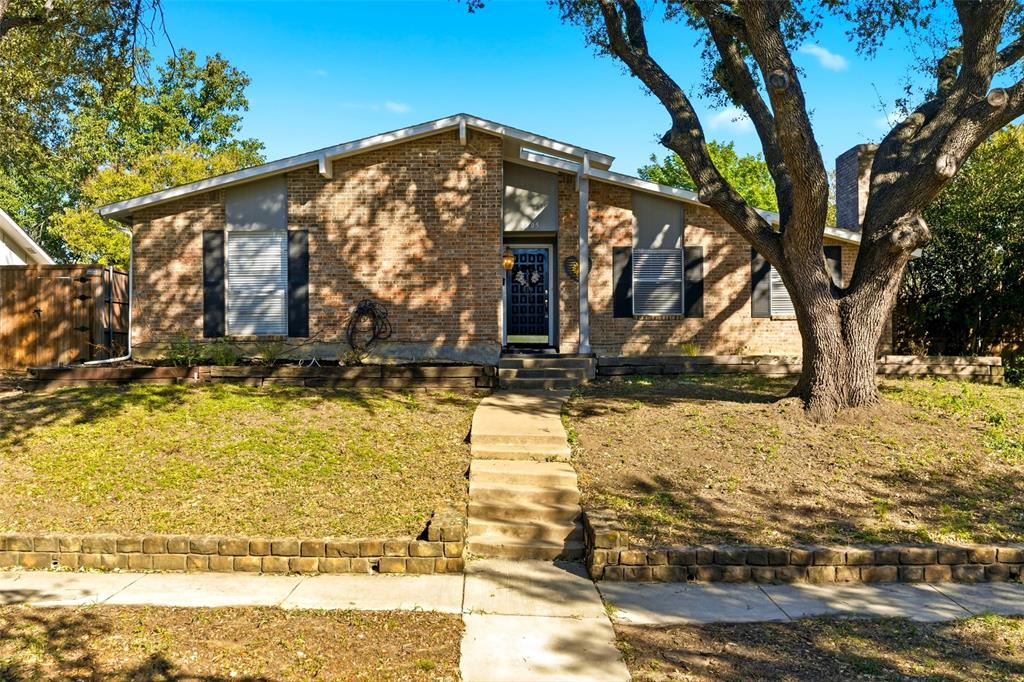 1805 Haymeadow Carrollton, TX 75007 - Photo 1 of 20 a view of a house with snow on the ground