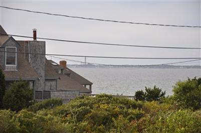 9 Twinefield Road Truro, MA 02666 - Photo 3 of 15 a view of a house with a street