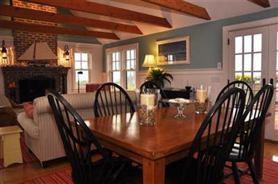 9 Twinefield Road Truro, MA 02666 - Photo 6 of 15 a view of a dining room with furniture