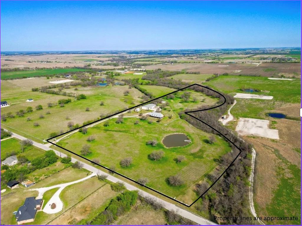 11918 Riek Road Krum, TX 76249 - Photo 39 of 40 a view of an ocean from a balcony