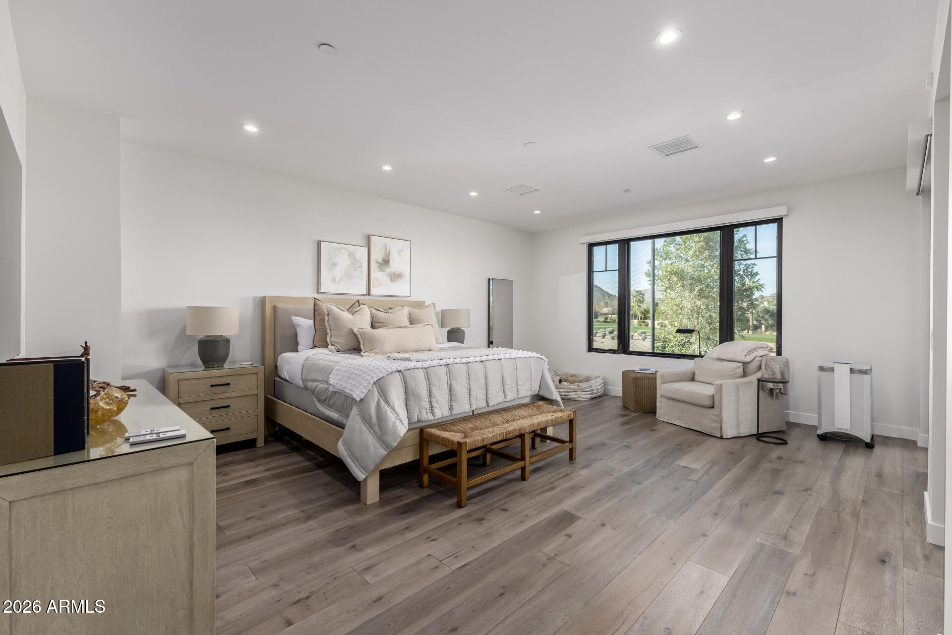 6500 East Camelback Road, Unit 1010 Scottsdale, AZ 85251 - Photo 11 of 24 a bedroom with a bed and large window