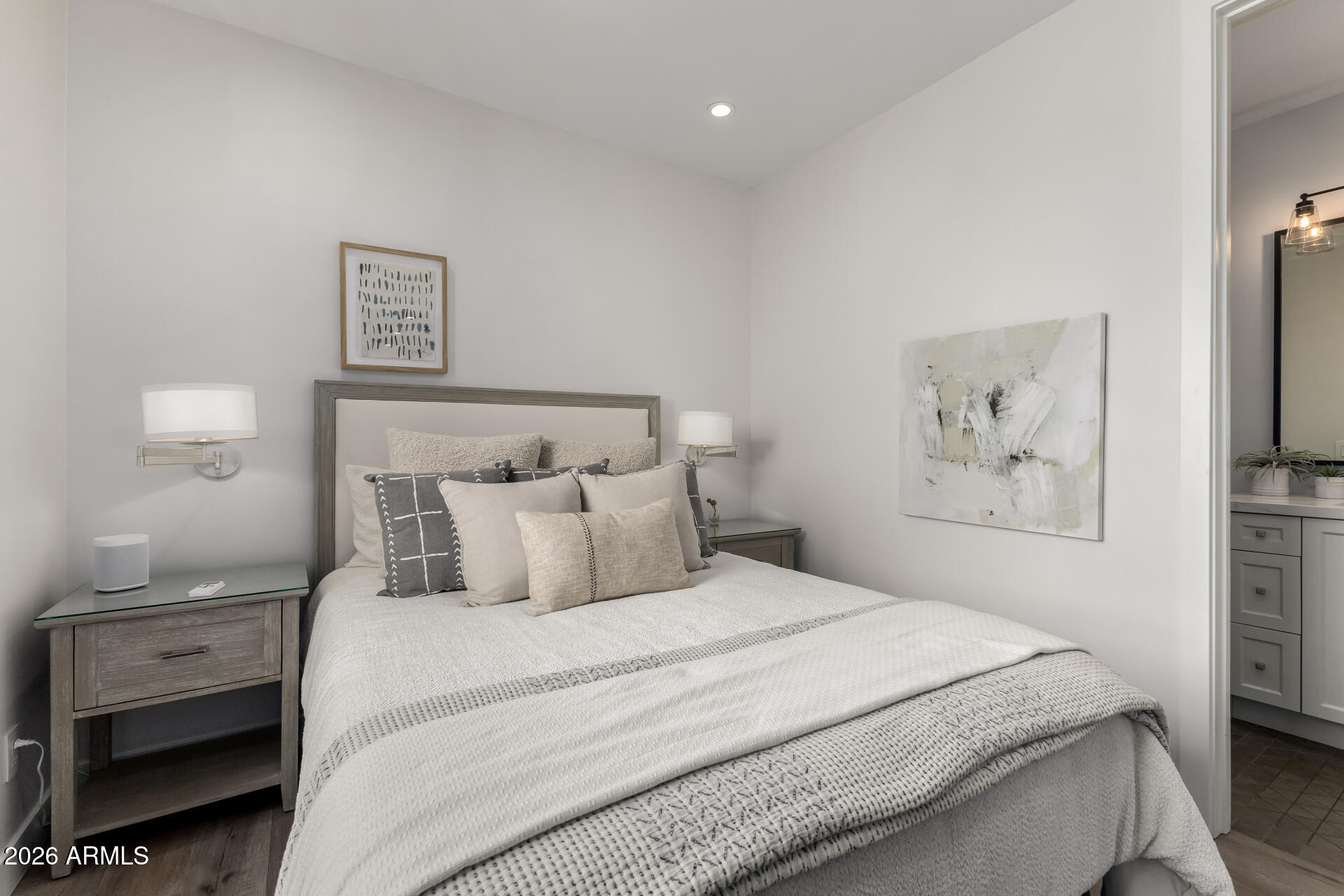 6500 East Camelback Road, Unit 1010 Scottsdale, AZ 85251 - Photo 16 of 24 a bedroom with a bed and a view of hallway