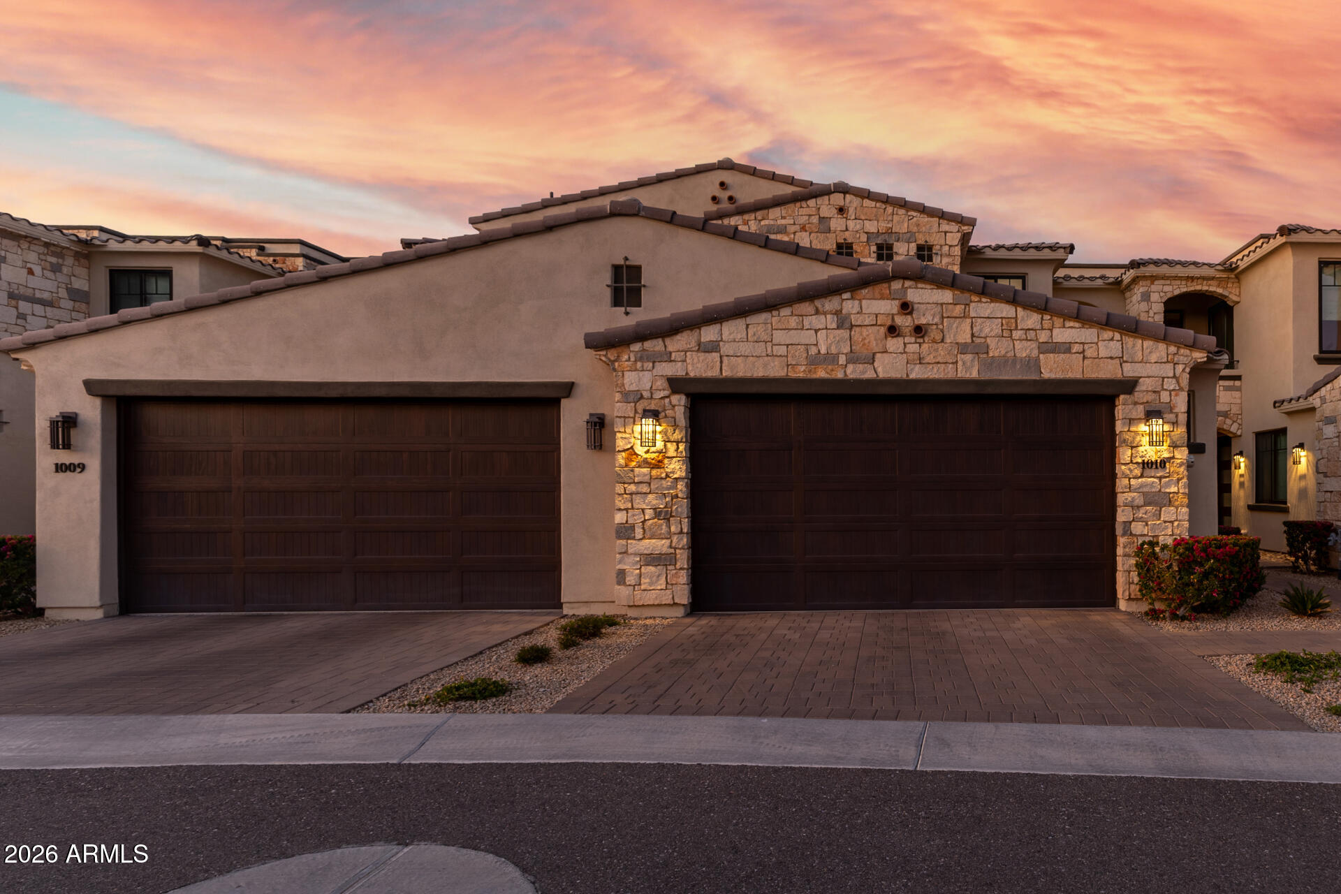 6500 East Camelback Road, Unit 1010 Scottsdale, AZ 85251 - Photo 24 of 24 a front view of a house with a garage