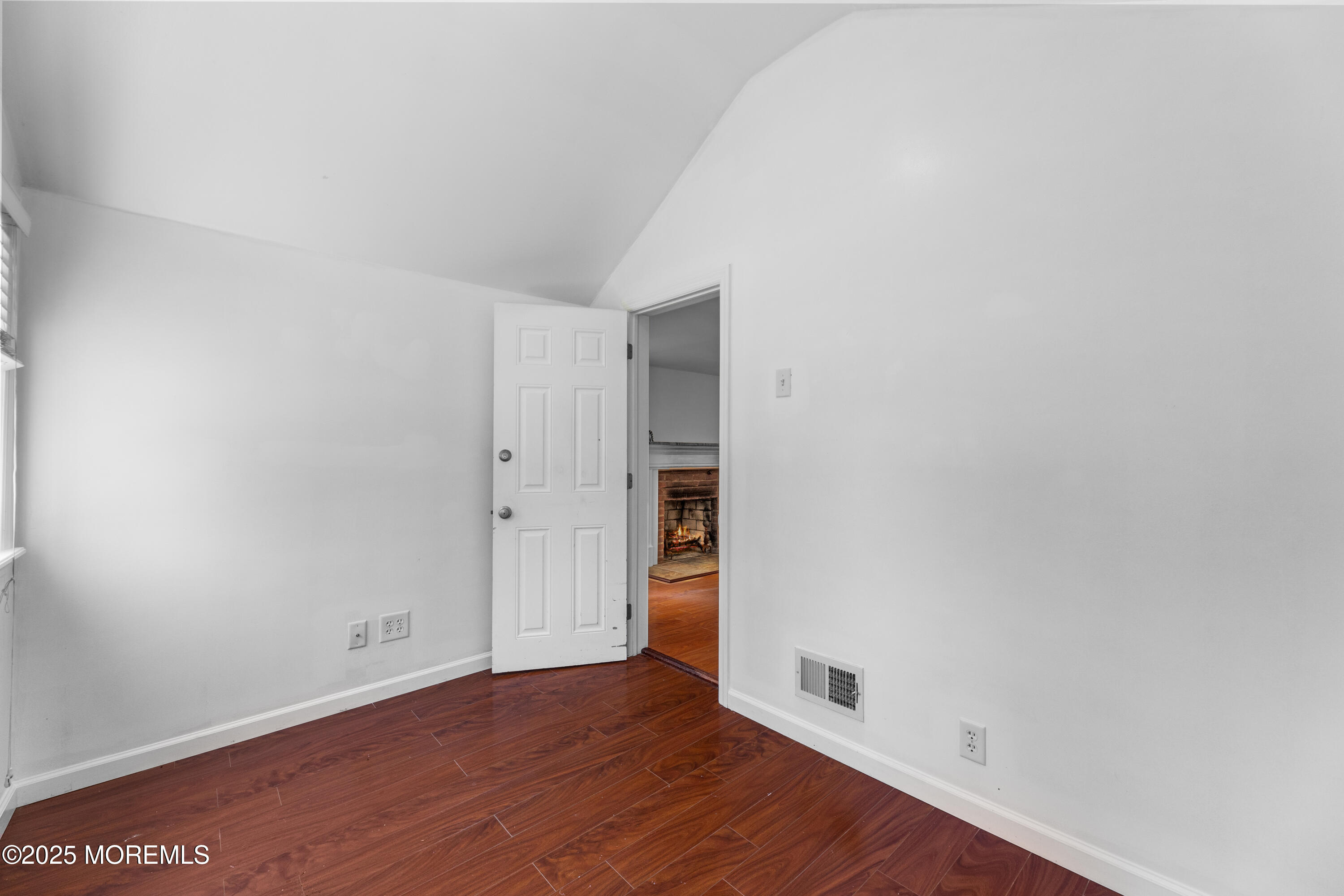 474 Burnt Bark Road Brick, NJ 08723 - Photo 19 of 28 a view of an empty room with wooden floor
