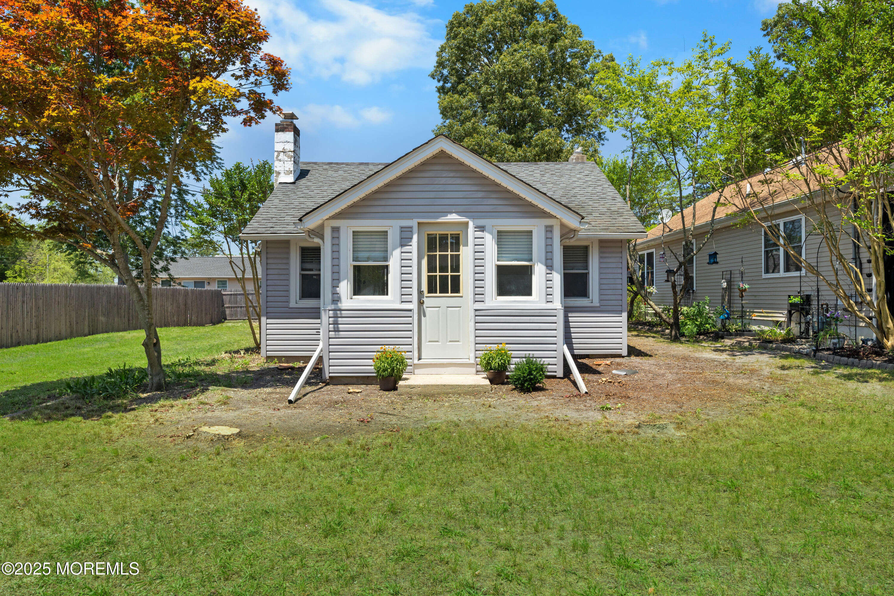 474 Burnt Bark Road Brick, NJ 08723 - Photo 2 of 28 a view of a house with a yard and a tree
